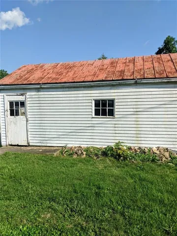 a view of a backyard with a garden