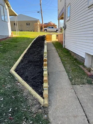 a view of a backyard with sitting area