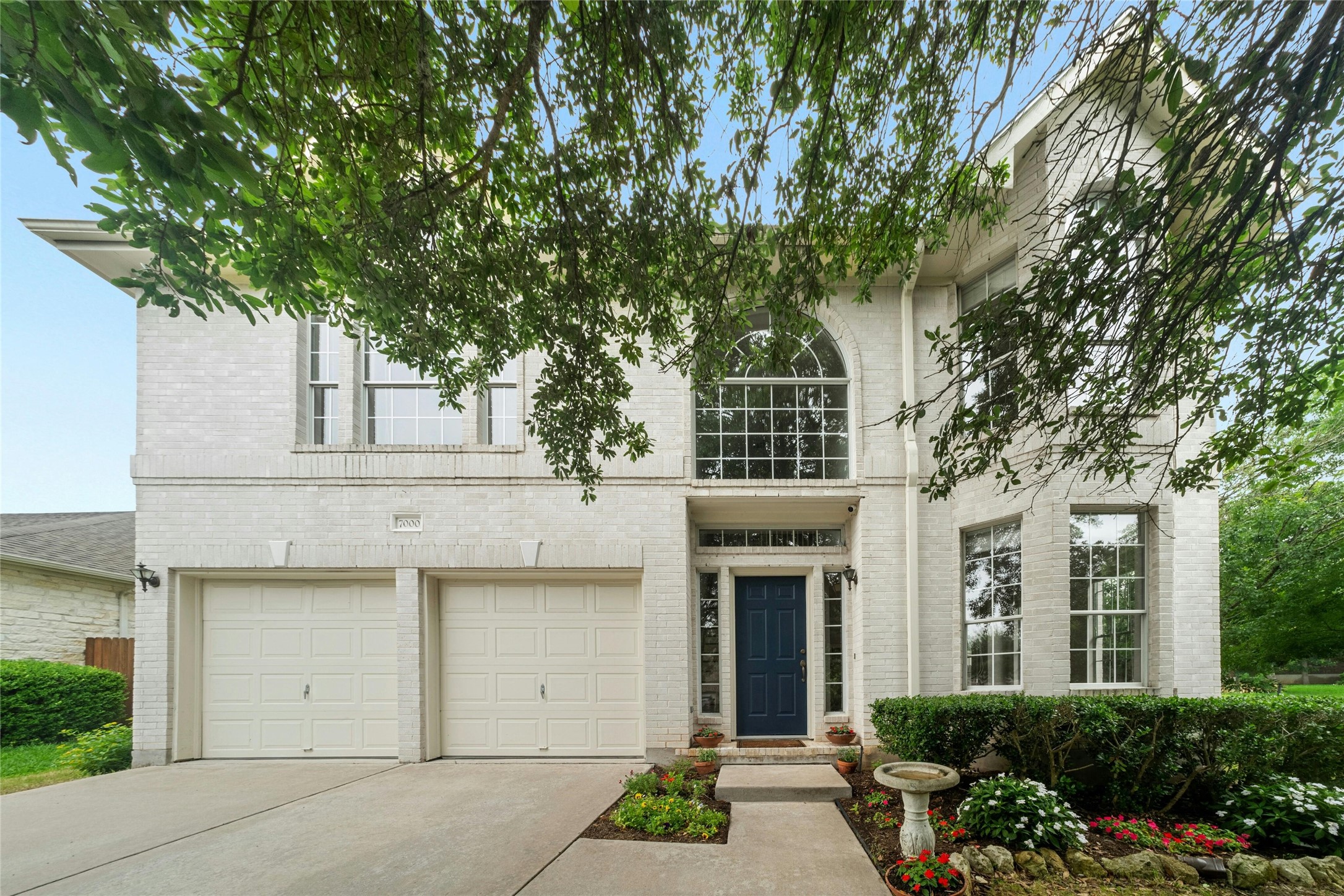 7000 Wandering Oak Road Austin, TX 78749 - Photo 1 of 1 front view of a house with a tree