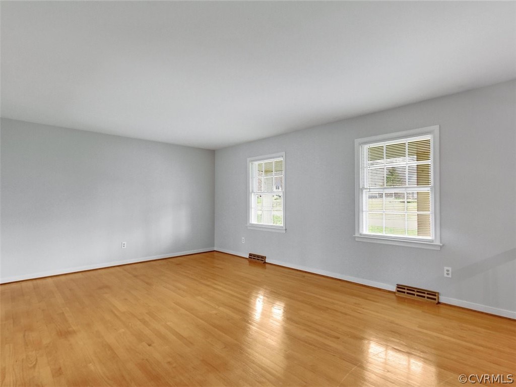13105 Buckland Road Chester, VA 23831 - Photo 5 of 46 a view of an empty room with a window