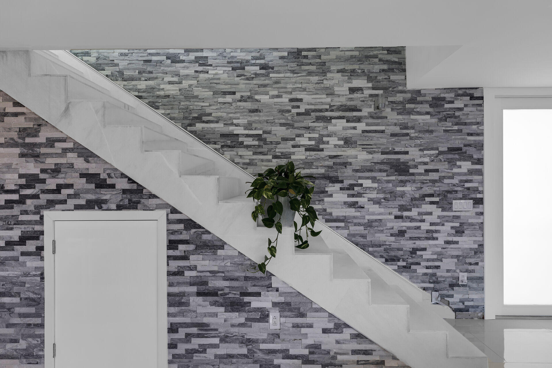 209 Corsair Road Duck Key, FL 33050 - Photo 13 of 38 Stacked Stone Accent Wall