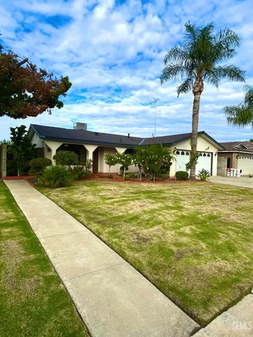 a view of swimming pool with outdoor seating