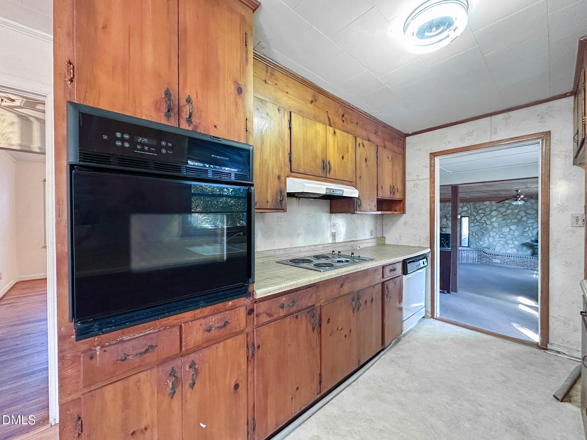 188 Jones Chapel Road Norlina, NC 27563 - Photo 24 of 71 a kitchen with stainless steel appliances granite countertop a stove microwave and refrigerator