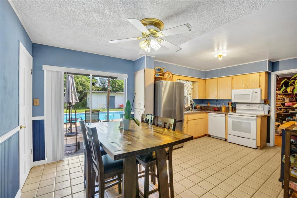 517 Marianna Road Auburndale, FL 33823 - Photo 16 of 37 a view of a dining room with furniture window and outside view