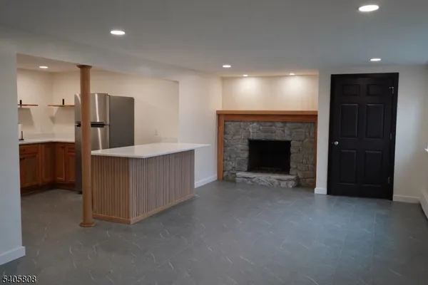 a kitchen with stainless steel appliances a refrigerator and a sink