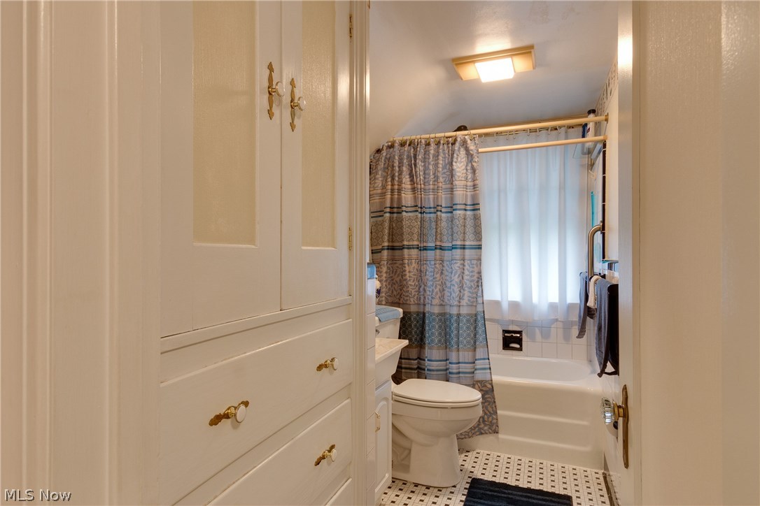 7579 Little Mountain Road Mentor, OH 44060 - Photo 20 of 33 Built ins and ceramic tile floor true to the era