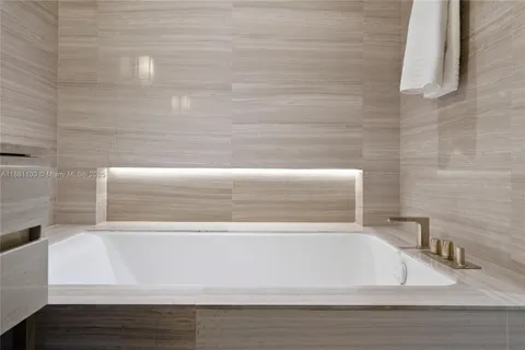 a bathroom with a bathtub