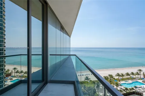 a view of a balcony with an ocean view