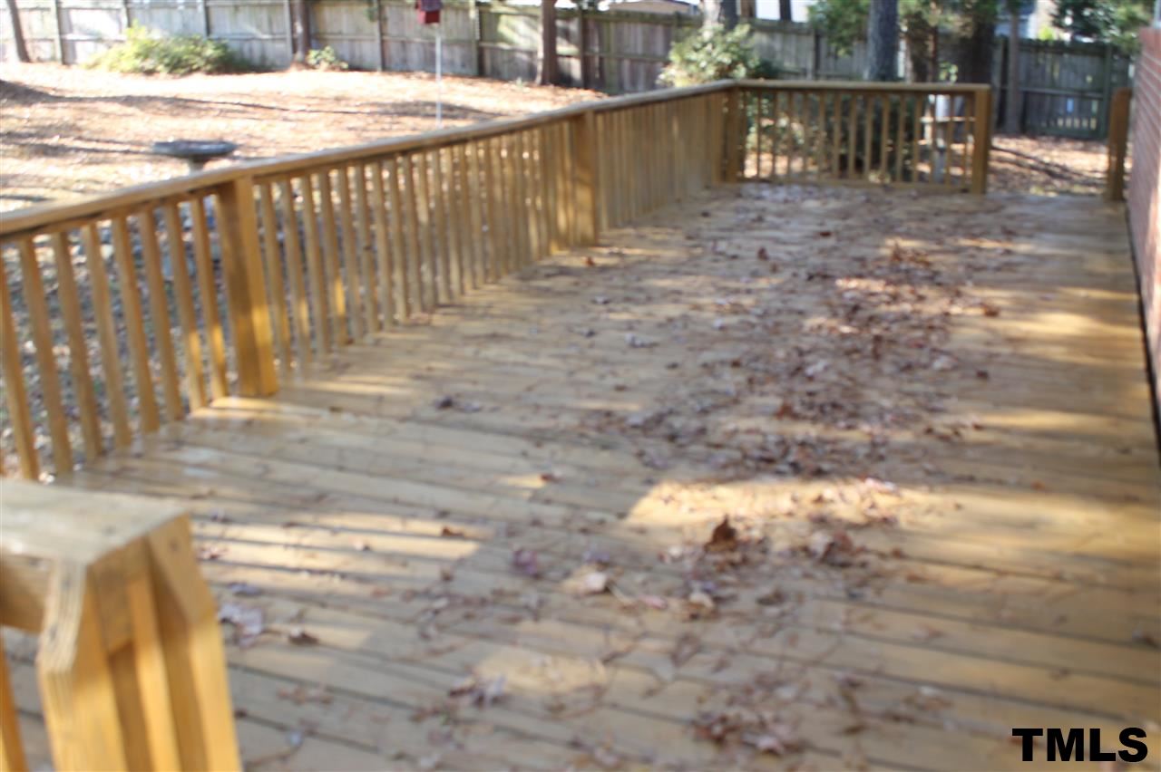 3900 Pearl Road Raleigh, NC 27610 - Photo 3 of 21 a view of a backyard of the house