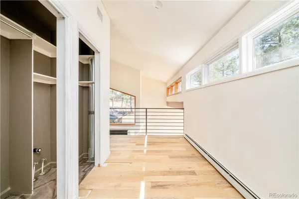 an empty room with windows