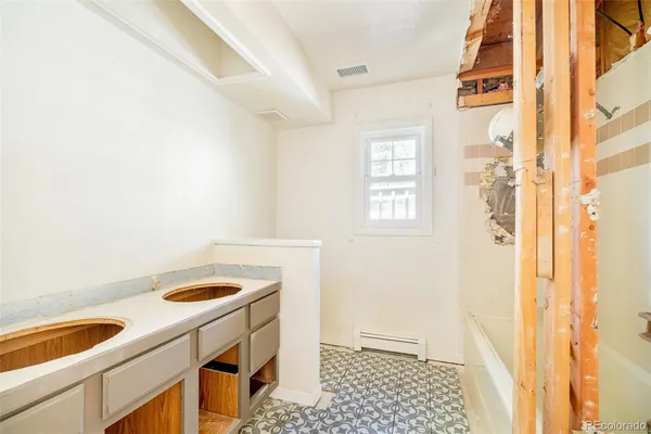 a view of empty room with windows