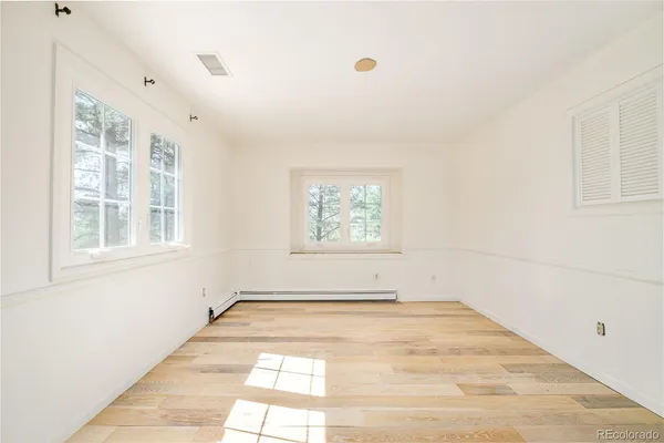 a view of large room with wooden walls
