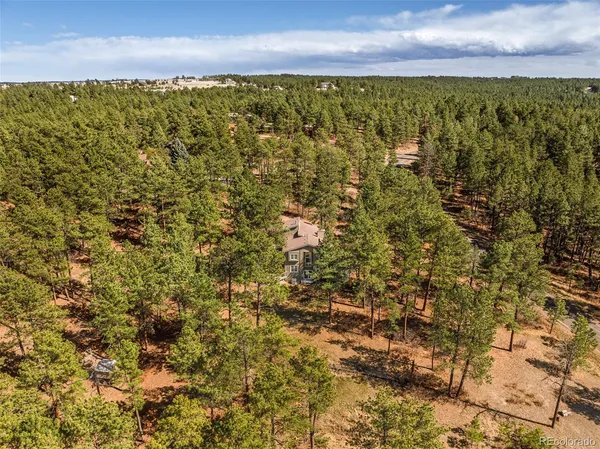a view of a yard with an outdoor space