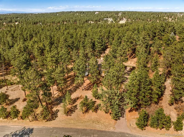 a view of a field with an outdoor space