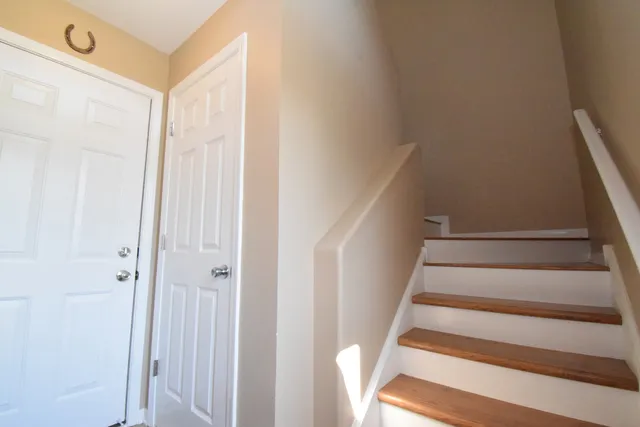 a view of staircase with white walls and white walls