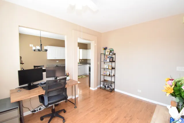 a view of a workspace with furniture