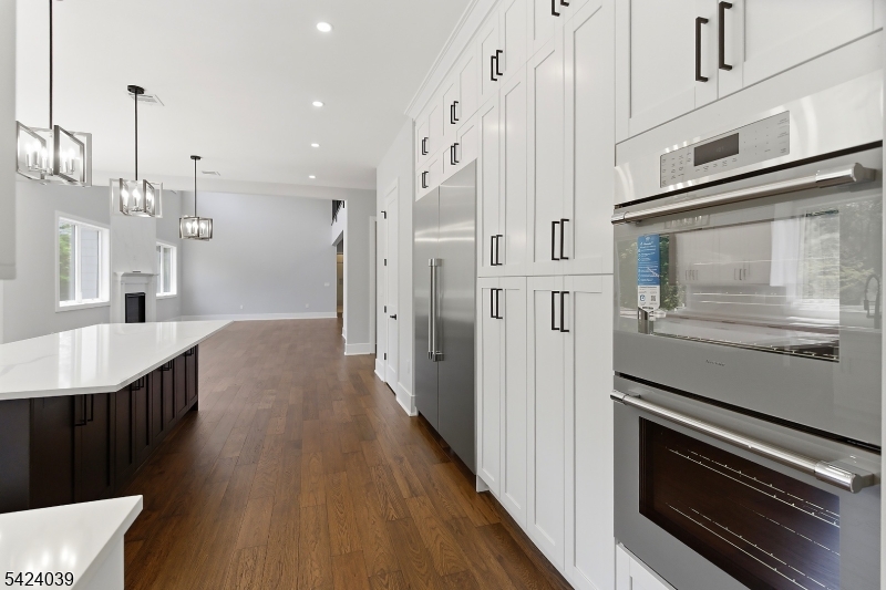 45 Kildee Road Belle Mead, NJ 08502 - Photo 9 of 43 a kitchen with stainless steel appliances a refrigerator a stove and white cabinets