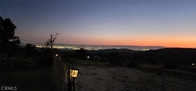 a sunset view with a sitting space