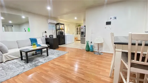 a living room with furniture and a table