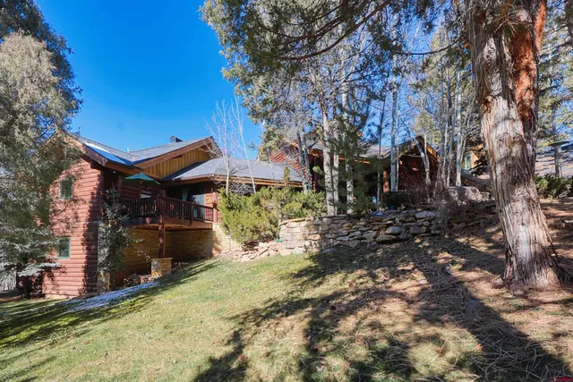 a bedroom with a bed and a fireplace