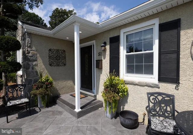 a front view of a house with patio