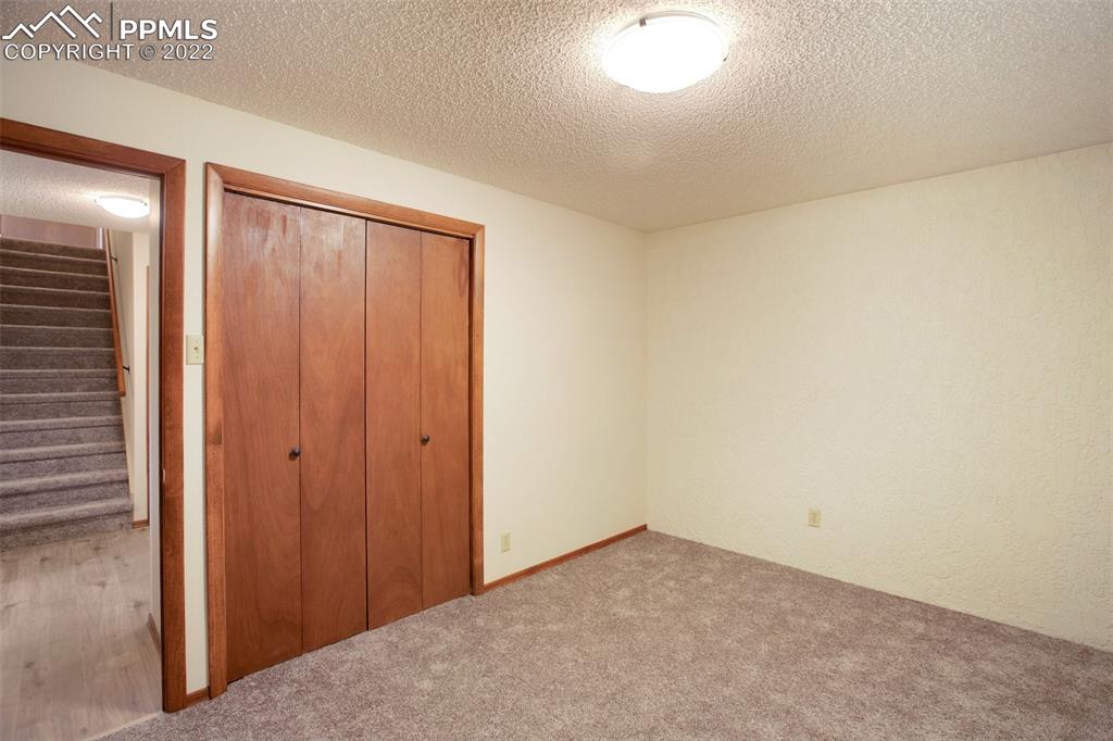 9610 Mohawk Trail Cascade, CO 80809 - Photo 24 of 38 a view of an empty room