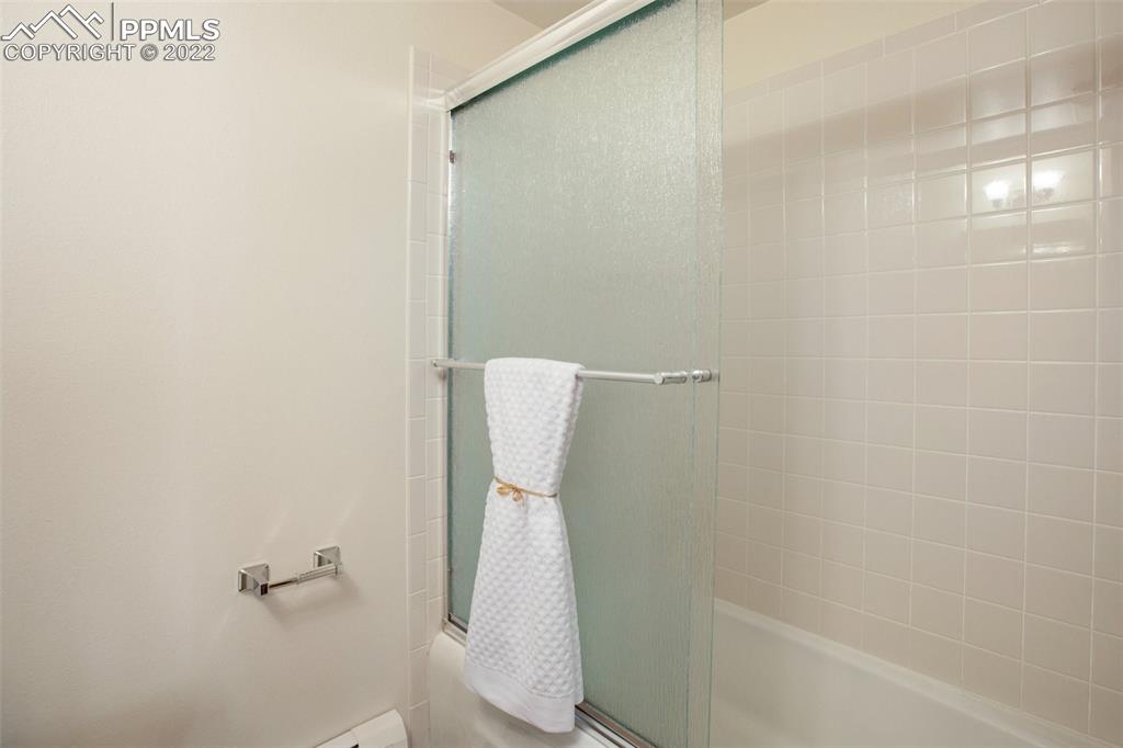 9610 Mohawk Trail Cascade, CO 80809 - Photo 26 of 38 a bathroom with a shower