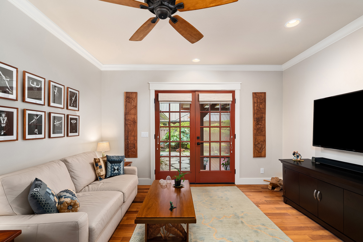65-1288 Hoku Road Kamuela, HI 96743 - Photo 17 of 29 a living room with furniture and a flat screen tv