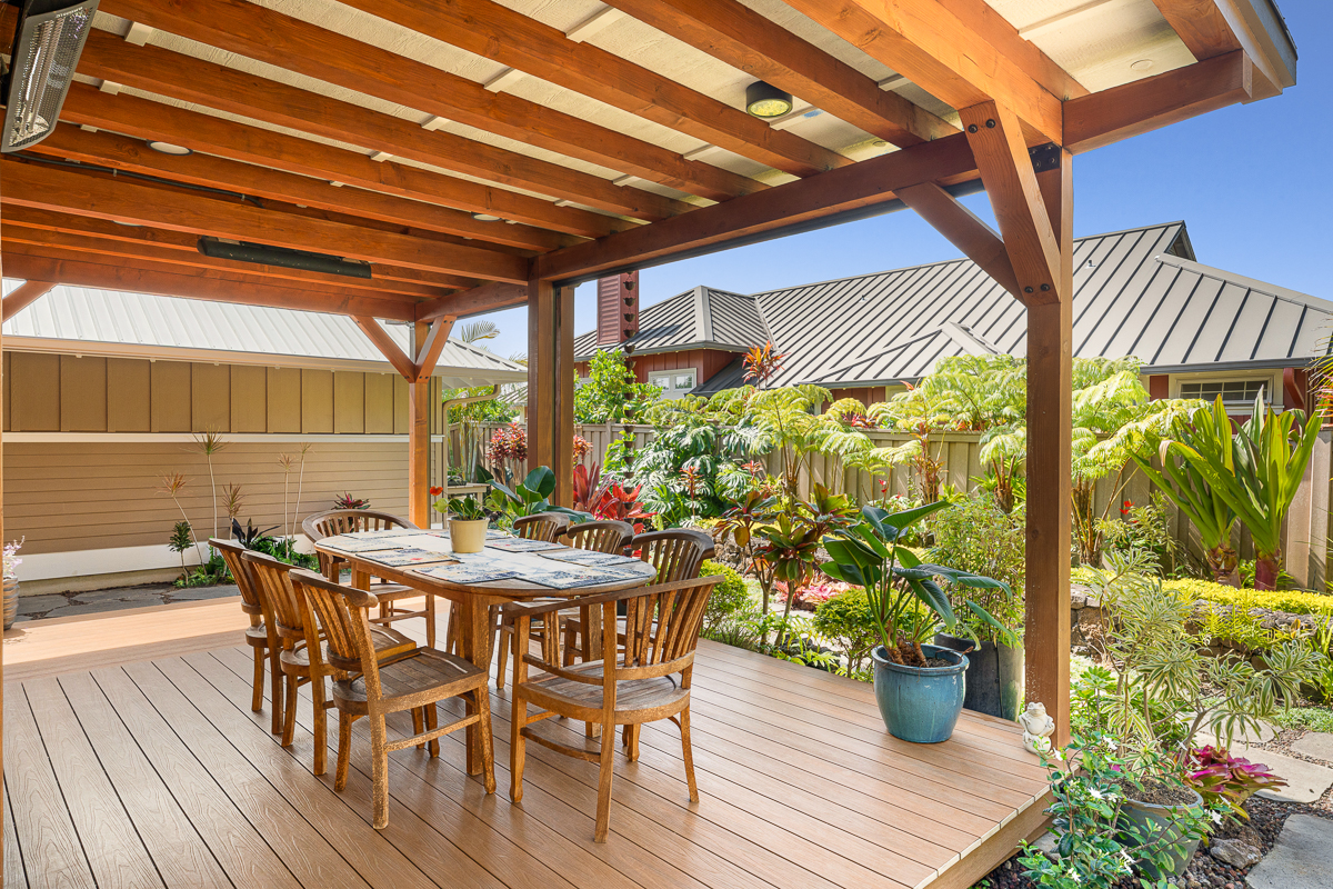 65-1288 Hoku Road Kamuela, HI 96743 - Photo 24 of 29 a view of a patio with table and chairs and potted plants