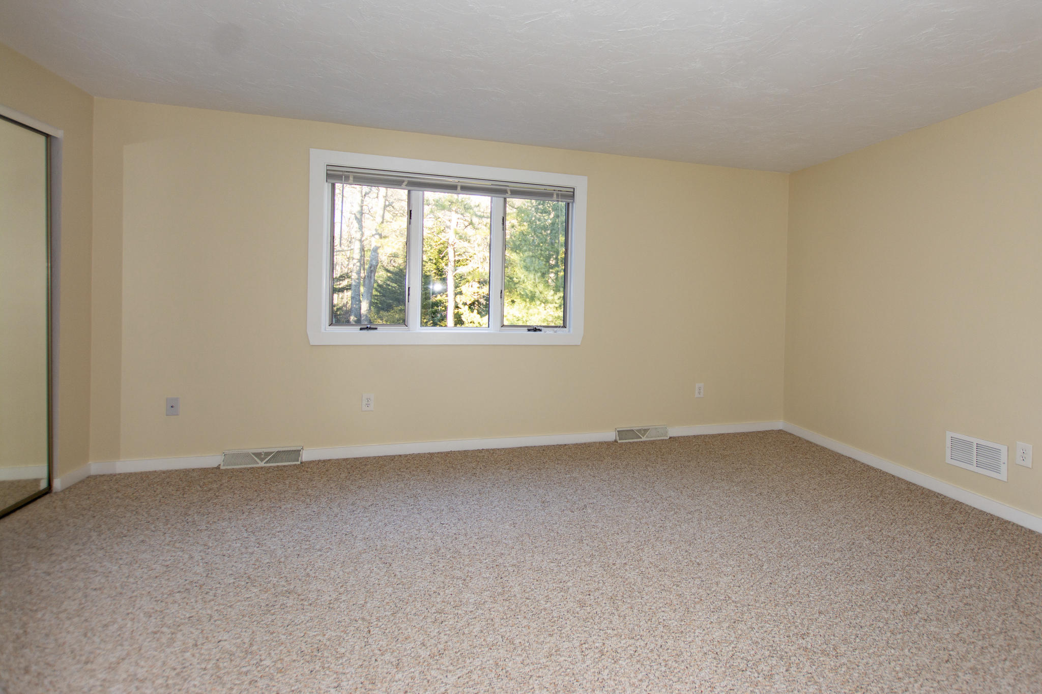 52 Shellback Way, Unit H Mashpee, MA 02649 - Photo 13 of 20 an empty room with a window