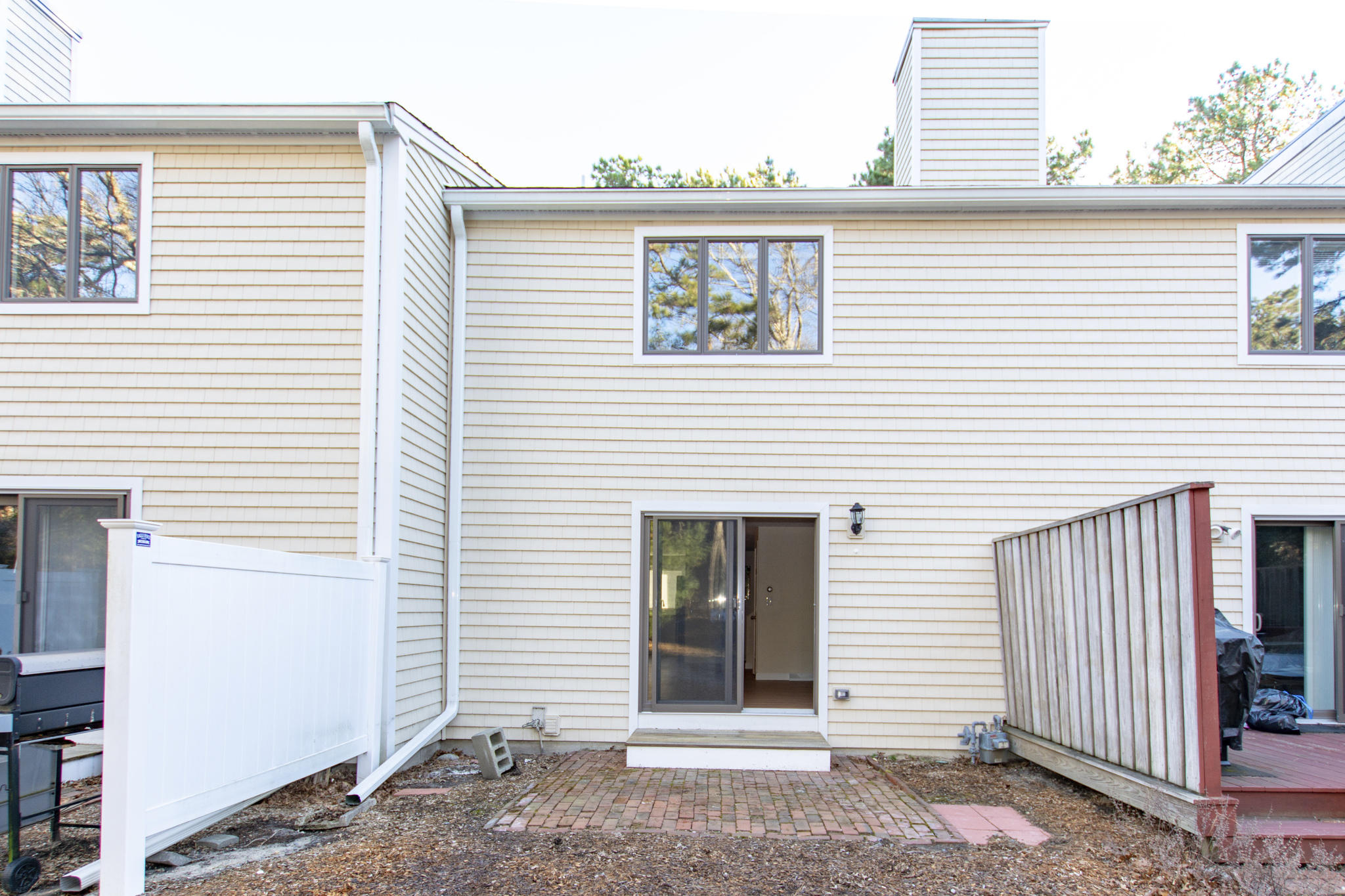 52 Shellback Way, Unit H Mashpee, MA 02649 - Photo 17 of 20 a view of a house with a balcony
