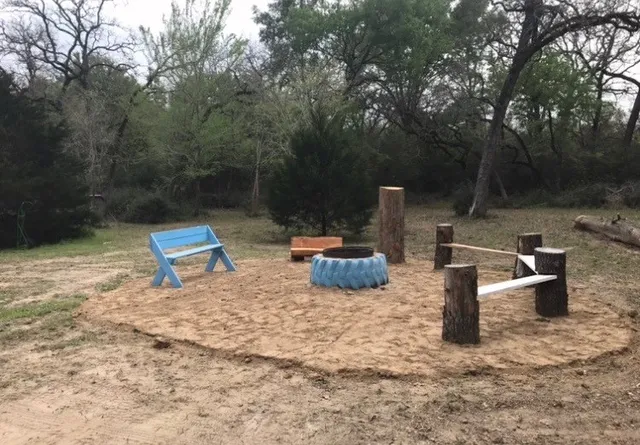 a view of a house with a tree in front