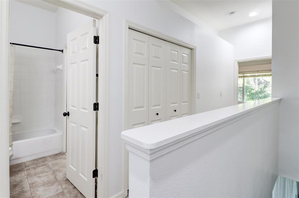 6243 Duck Key Court Tampa, FL 33625 - Photo 15 of 38 a bathroom with a tub and a shower