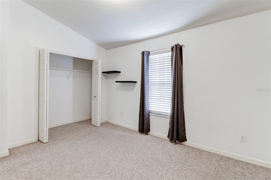 6243 Duck Key Court Tampa, FL 33625 - Photo 26 of 38 a view of an empty room with a fireplace