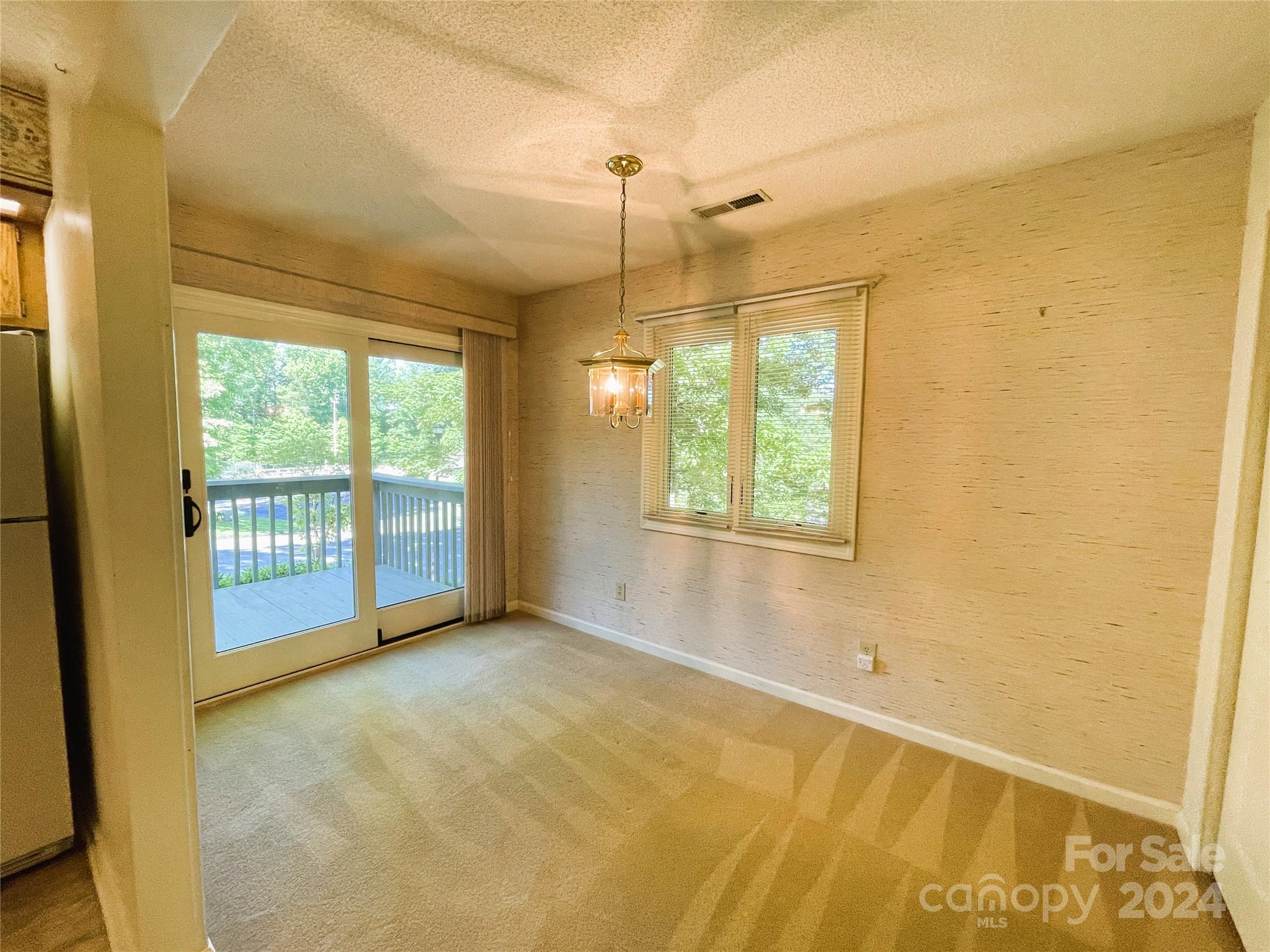 101 Independence Trail Morganton, NC 28655 - Photo 21 of 45 a view of an empty room with a window