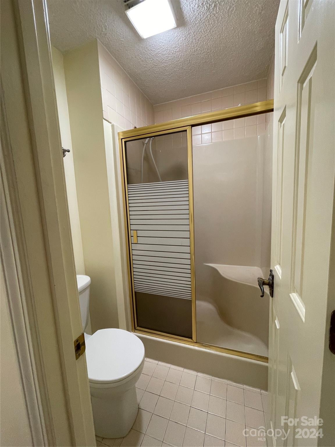 101 Independence Trail Morganton, NC 28655 - Photo 31 of 45 a bathroom with a shower and a toilet