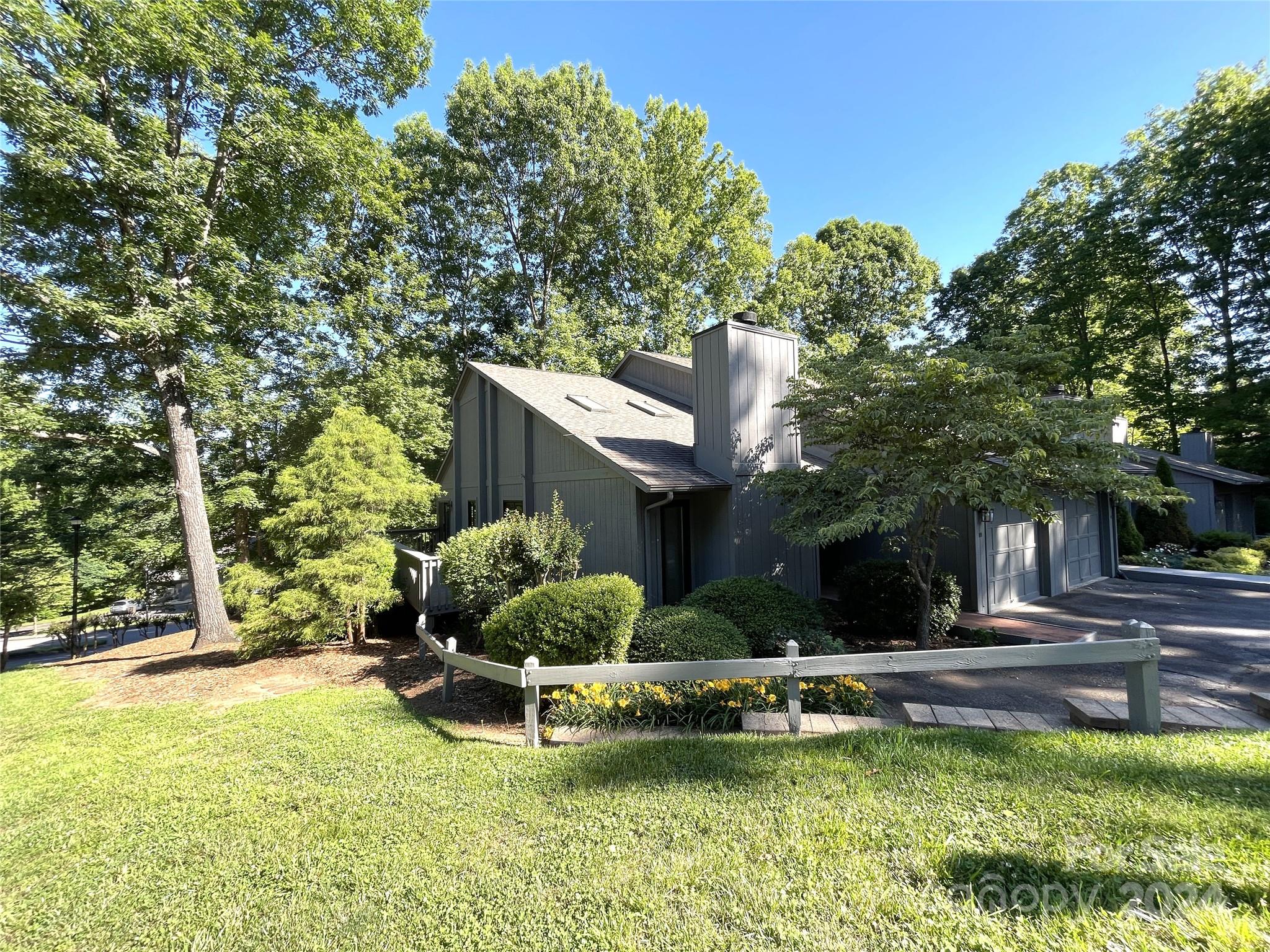 101 Independence Trail Morganton, NC 28655 - Photo 4 of 45 a swimming pool with outdoor seating and yard