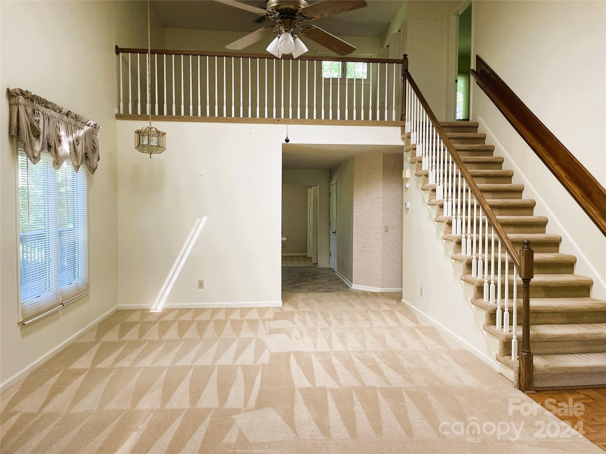 101 Independence Trail Morganton, NC 28655 - Photo 9 of 45 a view of a hallway with wooden floor and entryway