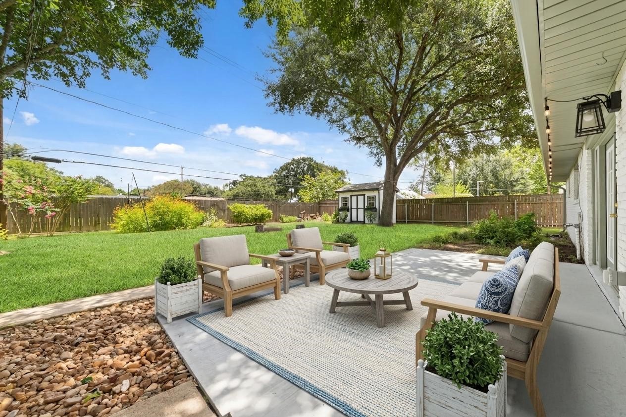 5922 Hummingbird Street Houston, TX 77096 - Photo 6 of 26 Step outside and discover one of this home's standout features: no rear neighbors. Whether you're hosting friends, grilling on the weekend, or simply enjoying a quiet evening, you'll appreciate the added privacy. (VS)