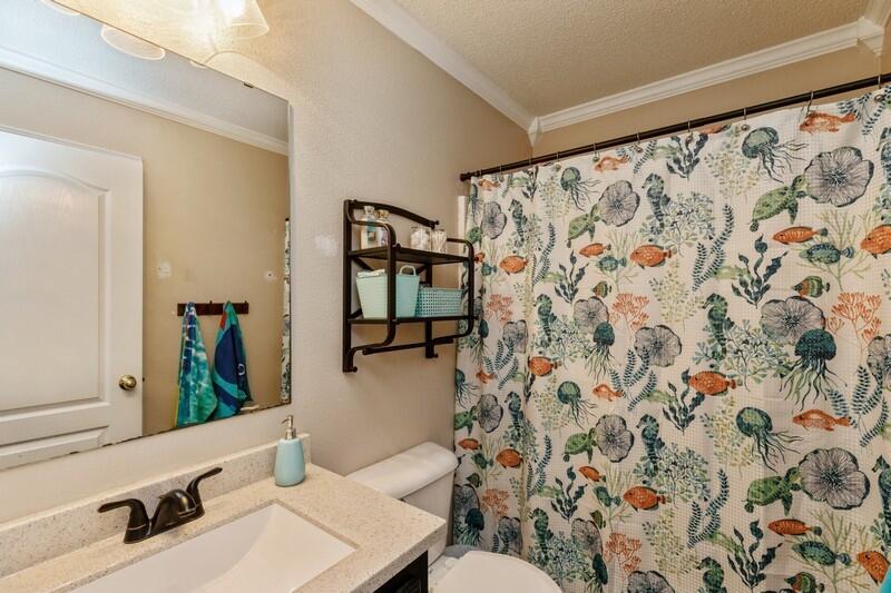 422 Swift Fox Run Crestview, FL 32536 - Photo 20 of 35 a bathroom with a sink and a mirror