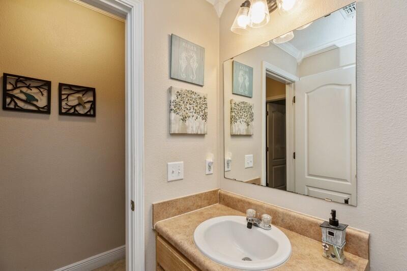 422 Swift Fox Run Crestview, FL 32536 - Photo 23 of 35 a bathroom with a sink and a mirror