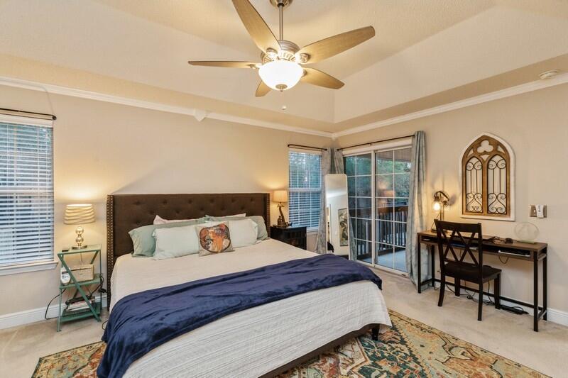 422 Swift Fox Run Crestview, FL 32536 - Photo 25 of 35 a bedroom with a bed and a table
