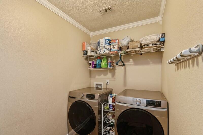 422 Swift Fox Run Crestview, FL 32536 - Photo 31 of 35 a utility room with dryer and washer