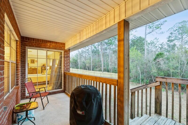 422 Swift Fox Run Crestview, FL 32536 - Photo 34 of 35 a view of a balcony with furniture