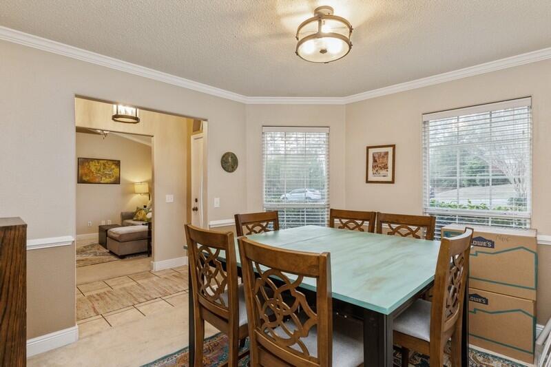 422 Swift Fox Run Crestview, FL 32536 - Photo 8 of 35 a view of a dining room with furniture window and outside view