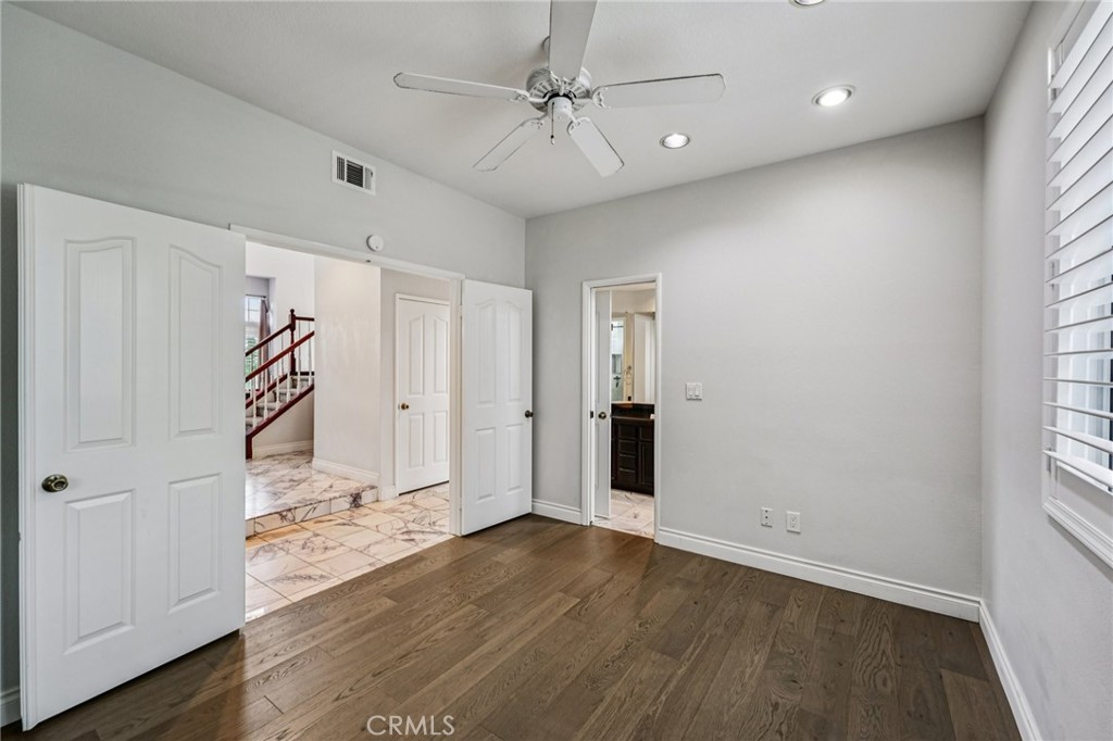901 Clearwood Avenue Riverside, CA 92506 - Photo 11 of 36 wooden floor in an empty room with a window