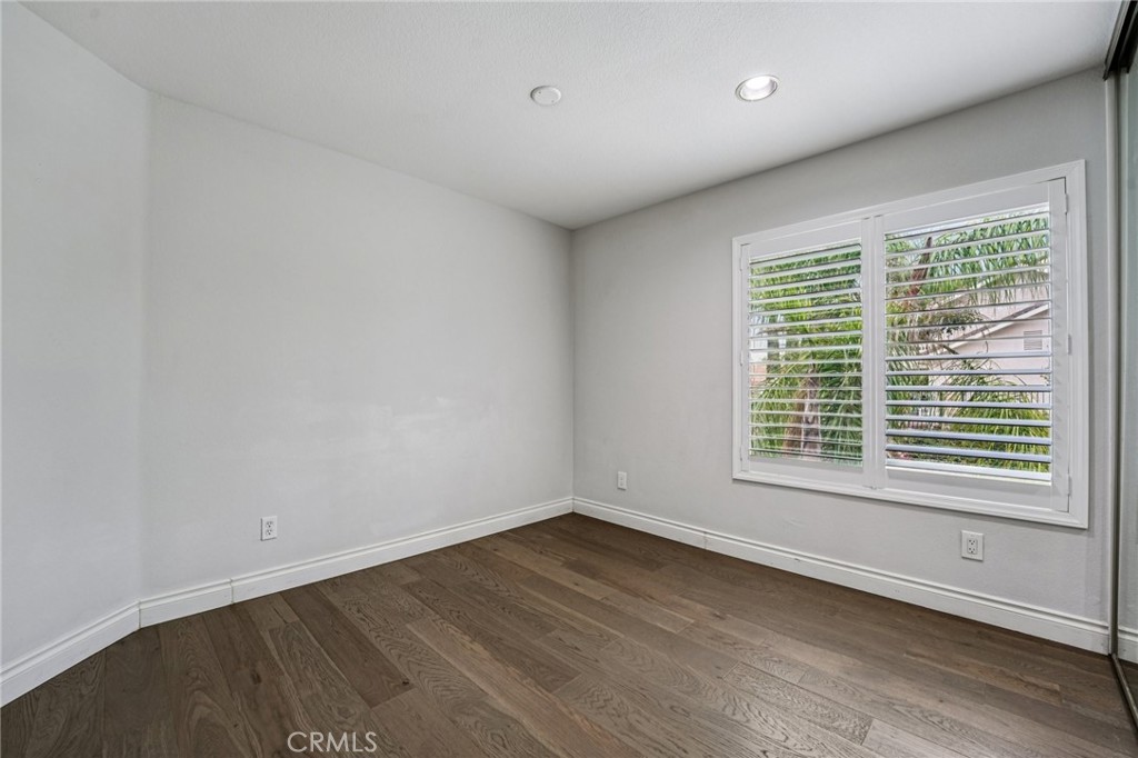 901 Clearwood Avenue Riverside, CA 92506 - Photo 18 of 36 wooden floor in an empty room with a window