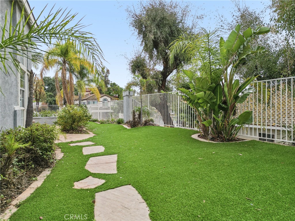 901 Clearwood Avenue Riverside, CA 92506 - Photo 25 of 36 a view of a garden with a slide