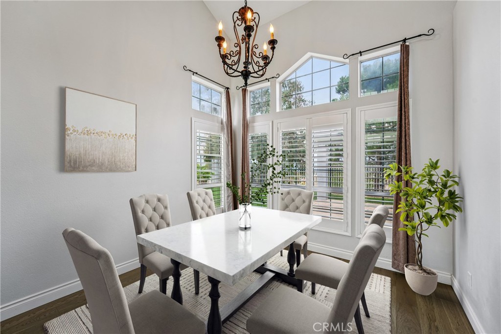 901 Clearwood Avenue Riverside, CA 92506 - Photo 5 of 36 a view of a dining room with furniture window and wooden floor