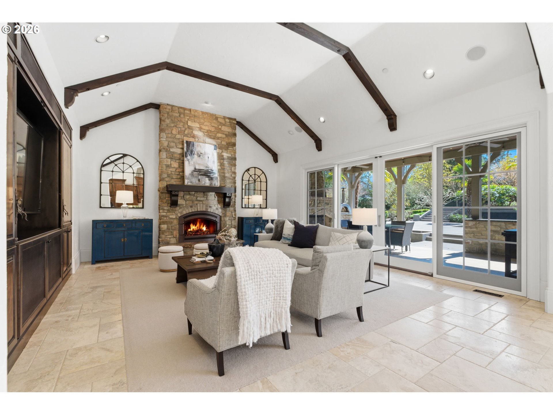 951 Atwater Road Lake Oswego, OR 97034 - Photo 13 of 46 a living room with fireplace furniture and a large window